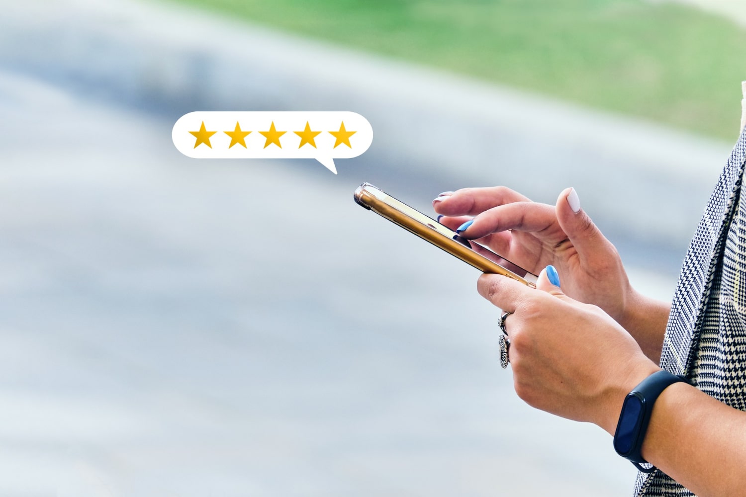 Person on their phone leaving a 5 star Google review 