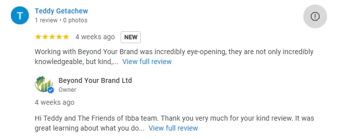 Review for Beyond Your Brand, with the 'Report review' button highlighted