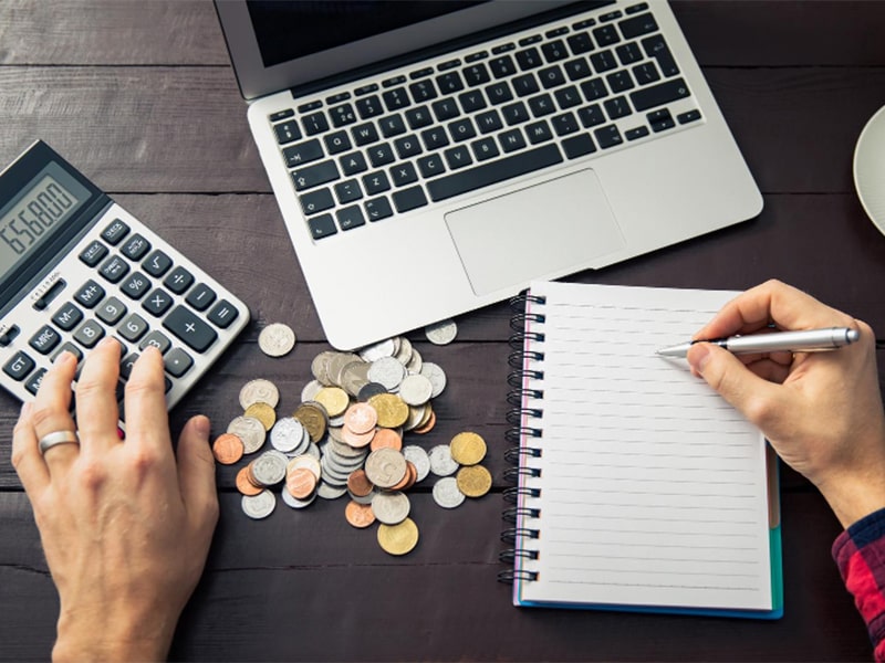 Man calculating his website budget