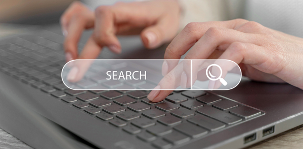 A person typing keywords