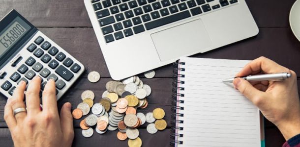 Man calculating his website budget