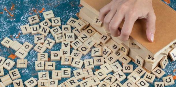 Wooden dice with printed letters