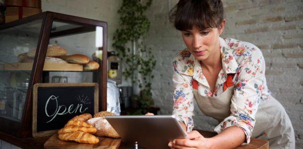woman using digital tablet