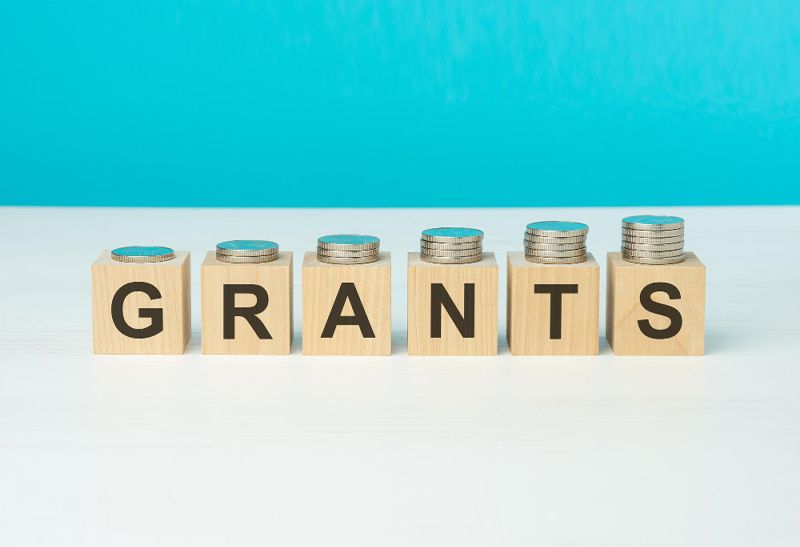 Wooden blocks spelling out the word grants