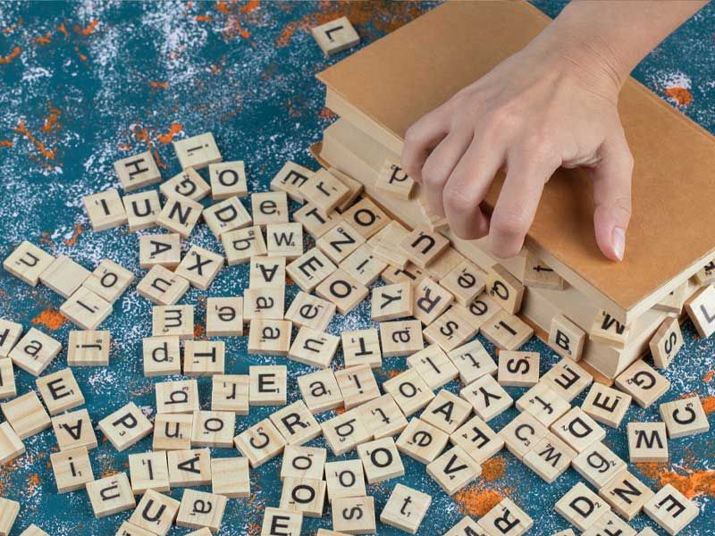 Wooden dice with printed letters