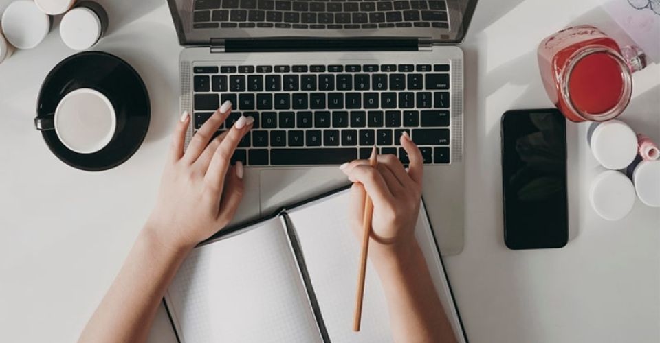 person working on updating her website