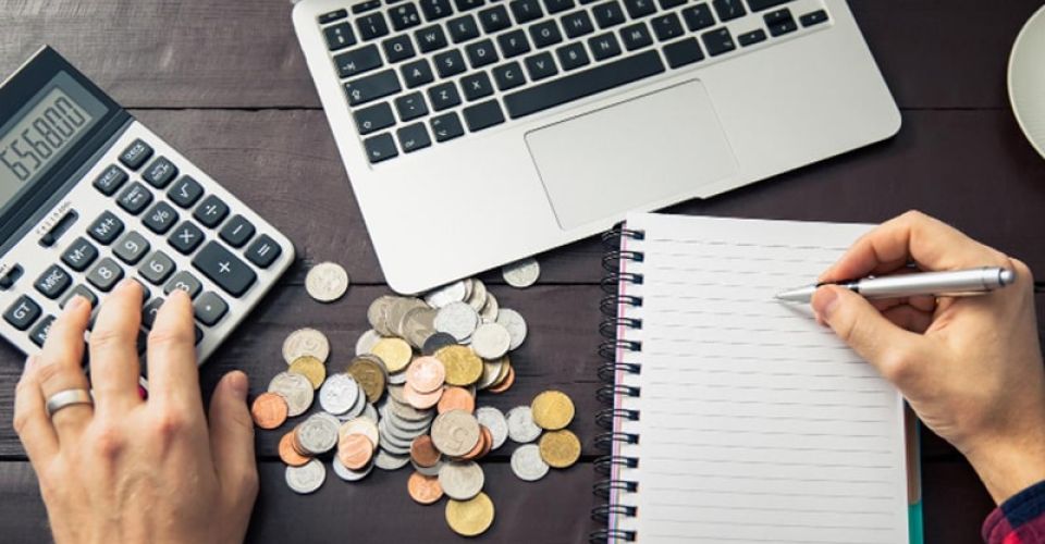 Man calculating his website budget