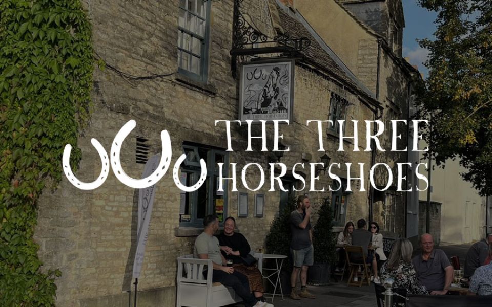 The Three Horseshoes logo and background